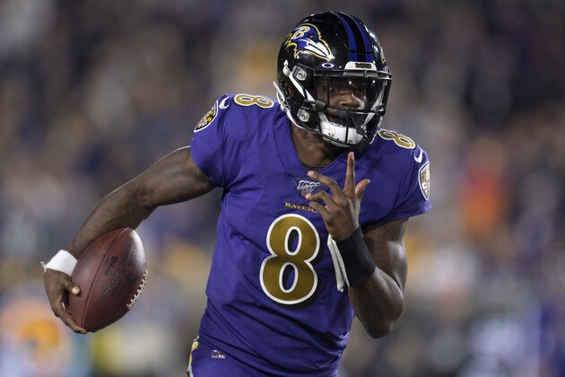 Baltimore Ravens quarterback Lamar Jackson runs against the Los Angeles Rams during the first half of an NFL football game Monday, Nov. 25, 2019, in Los Angeles. (AP Photo/Kyusung Gong)