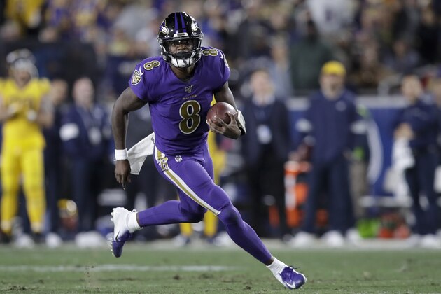 Baltimore Ravens quarterback Lamar Jackson runs against the Los Angeles Rams during the first half of an NFL football game Monday, Nov. 25, 2019, in Los Angeles. (AP Photo/Marcio Jose Sanchez)