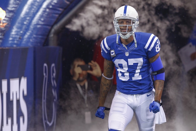 INDIANAPOLIS, IN - DECEMBER  14: Reggie Wayne #87 of the Indianapolis Colts takes the field during player introductions before the game against the Houston Texans at Lucas Oil Stadium on December 14, 2014 in Indianapolis, Indiana. (Photo by Michael Hickey/Getty Images)