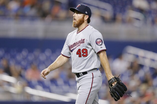MIAMI, FLORIDA - AUGUST 01:  Sam Dyson #49 of the Minnesota Twins reacts after being taken out of the game in the ninth inning against the Miami Marlins at Marlins Park on August 01, 2019 in Miami, Florida. (Photo by Michael Reaves/Getty Images)