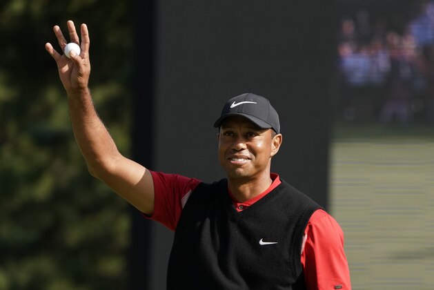 Tiger Woods of the United States reacts after his putt on the 18th hole during the final round of the Zozo Championship PGA Tour at the Accordia Golf Narashino country club in Inzai, east of Tokyo, Japan, Monday, Oct. 28, 2019. (AP Photo/Lee Jin-man)