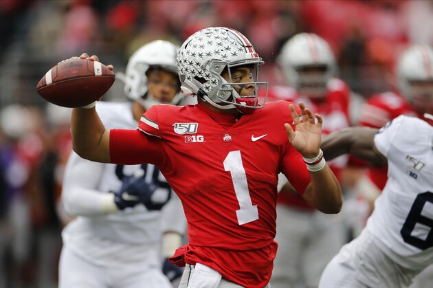 Ohio State quarterback Justin Fields plays against Penn State during an NCAA college football game Saturday, Nov. 23, 2019, in Columbus, Ohio. (AP Photo/Jay LaPrete)