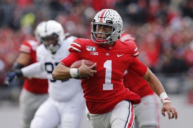 Ohio State quarterback Justin Fields plays against Penn State during an NCAA college football game Saturday, Nov. 23, 2019, in Columbus, Ohio. (AP Photo/Jay LaPrete)