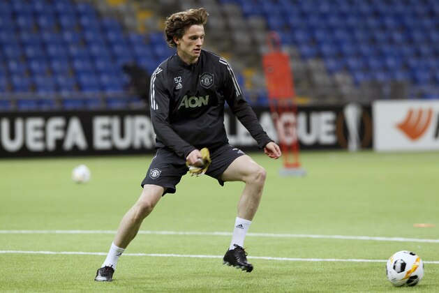 Manchester United's Max Taylor, a 19-year-old defender, attends his team training session at the Astana Arena stadium in Nur-Sultan, Kazakhstan, Wednesday, Nov. 27, 2019. Manchester United will play with Astana team in a Europa League Group stage, Group L soccer match on Thursday. (AP Photo/Alexei Filippov)