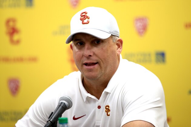LOS ANGELES, CALIFORNIA - NOVEMBER 23:  Head coach Clay Helton of the USC Trojans speaks to the media after defeating the UCLA Bruins 52-35 in a game at Los Angeles Memorial Coliseum on November 23, 2019 in Los Angeles, California. (Photo by Sean M. Haffey/Getty Images)
