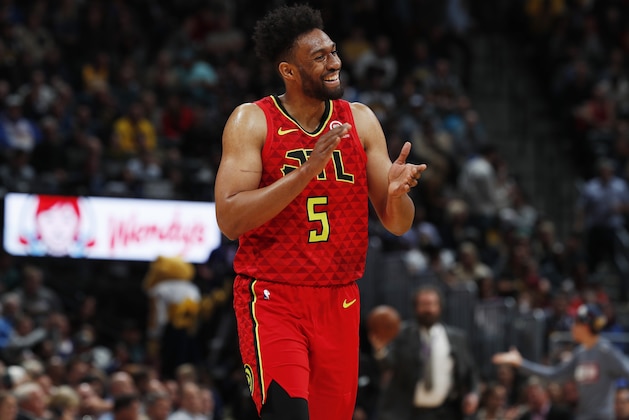 Atlanta Hawks forward Jabari Parker applauds for his teammates' play as a timeout is called during the second half of the team'ss NBA basketball game against the Denver Nuggets on Tuesday, Nov. 12, 2019, in Denver. Atlanta won 125-121. (AP Photo/David Zalubowski) Atlanta Hawks forward Jabari Parker applauds for his teammates' play as a timeout is called during the second half of the team'ss NBA basketball game against the Denver Nuggets on Tuesday, Nov. 12, 2019, in Denver. Atlanta won 125-121. (AP Photo/David Zalubowski)