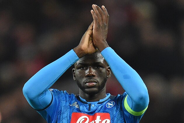 Napoli's Senegalese defender Kalidou Koulibaly applauds the fans following the UEFA Champions league Group E football match between Liverpool and Napoli at Anfield in Liverpool, north west England on November 27, 2019. - The match ended in a draw at 1-1. (Photo by Oli SCARFF / AFP) (Photo by OLI SCARFF/AFP via Getty Images)