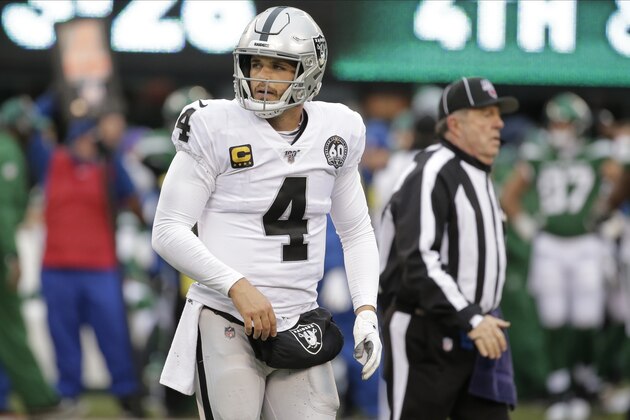 Oakland Raiders quarterback Derek Carr reacts during the second half of an NFL football game against the New York Jets Sunday, Nov. 24, 2019, in East Rutherford, N.J. (AP Photo/Seth Wenig)