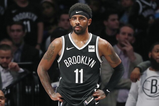 Brooklyn Nets guard Kyrie Irving (11) watces from the sideline during the second half of an NBA basketball game against the Indiana Pacers, Wednesday, Oct. 30, 2019, in New York. The Pacers defeatged the Nets 118-108. (AP Photo/Kathy Willens)