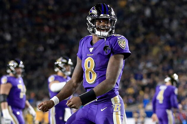 LOS ANGELES, CALIFORNIA - NOVEMBER 25:  Quarterback Lamar Jackson #8 of the Baltimore Ravens celebrates a play during the game against the Los Angeles Rams at Los Angeles Memorial Coliseum on November 25, 2019 in Los Angeles, California. (Photo by Sean M. Haffey/Getty Images)