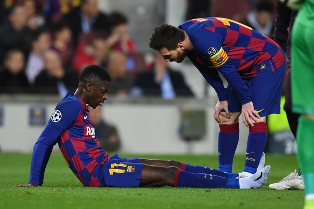 BARCELONA, SPAIN - NOVEMBER 27: Ousmane Dembele of FC Barcelona lies injured during the UEFA Champions League group F match between FC Barcelona and Borussia Dortmund at Camp Nou on November 27, 2019 in Barcelona, Spain. (Photo by Etsuo Hara/Getty Images)