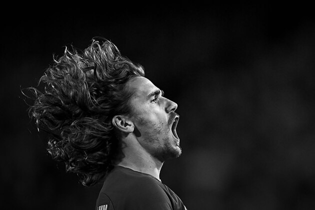 BARCELONA, SPAIN - NOVEMBER 27:  (Editors note: this image has been converted to black and white) Antoine Griezmann of Barcelona reacts during the UEFA Champions League group F match between FC Barcelona and Borussia Dortmund at Camp Nou on November 27, 2019 in Barcelona, Spain. (Photo by Pablo Morano/MB Media/Getty Images)