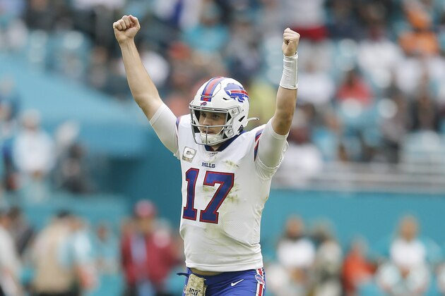 MIAMI, FLORIDA - NOVEMBER 17:  Josh Allen #17 of the Buffalo Bills reacts after throwing a touchdown pass to Dawson Knox #88 (not pictured) against the Miami Dolphins during the second quarter at Hard Rock Stadium on November 17, 2019 in Miami, Florida. (Photo by Michael Reaves/Getty Images)