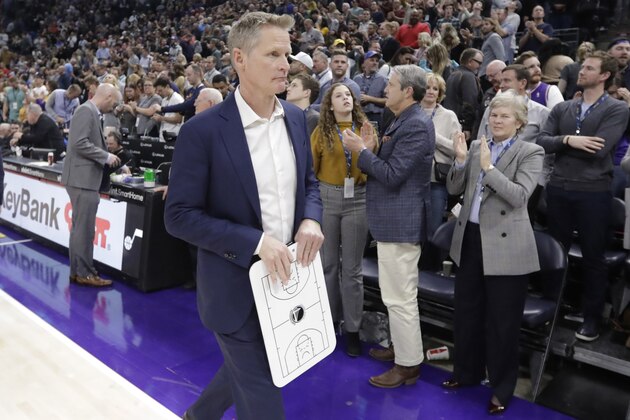 Golden State Warriors head coach Steve Kerr walks off the court following their NBA basketball game against the Utah Jazz Friday, Nov. 22, 2019, in Salt Lake City. (AP Photo/Rick Bowmer)