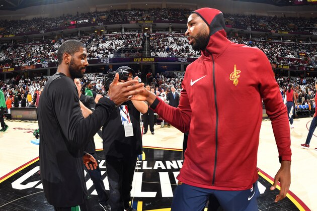 CLEVELAND, OH - OCTOBER 17:  Kyrie Irving #11 of the Boston Celtics shakes hands with Tristan Thompson #13 of the Cleveland Cavaliers before the game on October 17, 2017 at Quicken Loans Arena in Cleveland, Ohio. NOTE TO USER: User expressly acknowledges and agrees that, by downloading and/or using this Photograph, user is consenting to the terms and conditions of the Getty Images License Agreement. Mandatory Copyright Notice: Copyright 2017 NBAE (Photo by David Jesse D. Garrabrant/NBAE via Getty Images)
