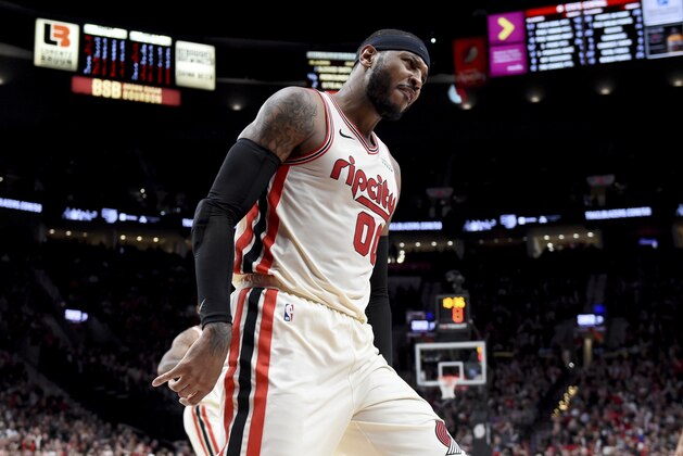 Portland Trail Blazers forward Carmelo Anthony reacts after hitting a shot during the second half of the team's NBA basketball game against the Oklahoma City Thunder in Portland, Ore., Wednesday, Nov. 27, 2019. The Blazers won 136-119. (AP Photo/Steve Dykes)