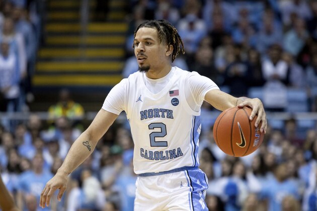 North Carolina's Cole Anthony (2) handles the ball during an NCAA college basketball game against Elon Wednesday, Nov. 20, 2019. (AP Photo/Ben McKeown)