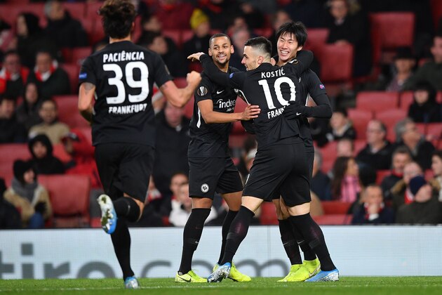 Frankfurt's Japanese midfielder Daichi Kamada (R) celebrates with teammates after he scores his team's first goal during their UEFA Europa league Group F football match between Arsenal and Eintracht Frankfurt at the Emirates stadium in London on November 28, 2019. (Photo by DANIEL LEAL-OLIVAS / AFP) (Photo by DANIEL LEAL-OLIVAS/AFP via Getty Images)
