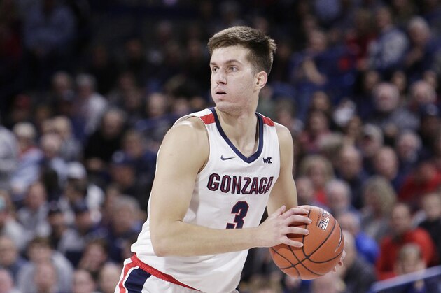 Gonzaga forward Filip Petrusev (3) looks to pass the ball during the first half of an NCAA college basketball game against Texas-Arlington in Spokane, Wash., Tuesday, Nov. 19, 2019. (AP Photo/Young Kwak)
