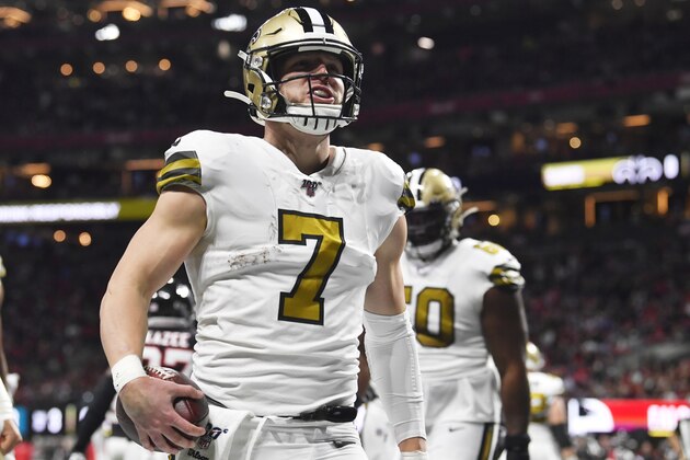 New Orleans Saints quarterback Taysom Hill (7) celebrates a touchdown against the Atlanta Falcons during the first half of an NFL football game, Thursday, Nov. 28, 2019, in Atlanta. (AP Photo/John Amis)