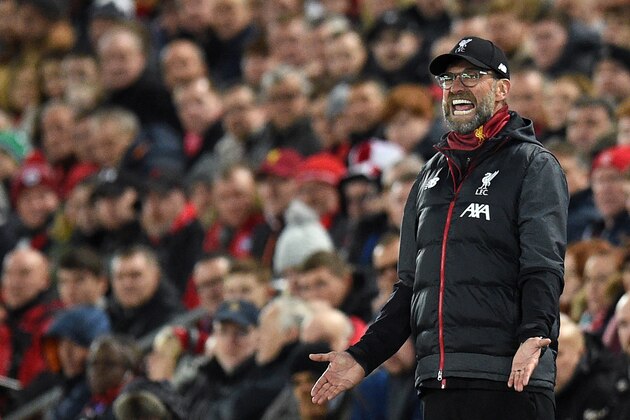 Liverpool's German manager Jurgen Klopp shouts instructions to his players from the touchline during the UEFA Champions league Group E football match between Liverpool and Napoli at Anfield in Liverpool, north west England on November 27, 2019. (Photo by Oli SCARFF / AFP) (Photo by OLI SCARFF/AFP via Getty Images)