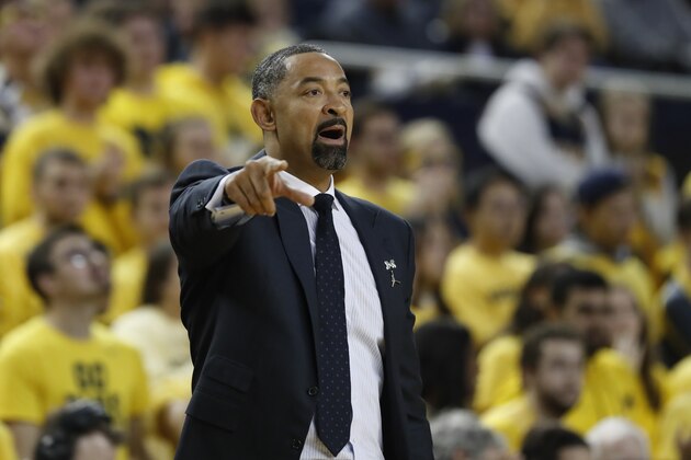 Michigan Wolverines head coach Juwan Howard signals from the sidelines during the first half of an NCAA college basketball game against Elon, Friday, Nov. 15, 2019, in Ann Arbor, Mich. (AP Photo/Carlos Osorio)