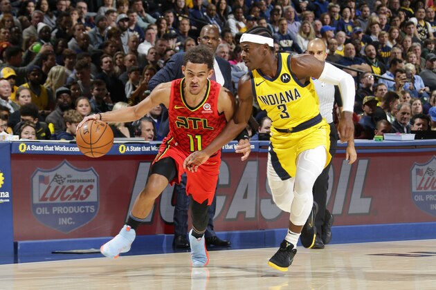 INDIANAPOLIS, IN - NOVEMBER 29: Trae Young #11 of the Atlanta Hawks handles the ball against the Indiana Pacers on November 29, 2019 at Bankers Life Fieldhouse in Indianapolis, Indiana. NOTE TO USER: User expressly acknowledges and agrees that, by downloading and or using this Photograph, user is consenting to the terms and conditions of the Getty Images License Agreement. Mandatory Copyright Notice: Copyright 2019 NBAE (Photo by Ron Hoskins/NBAE via Getty Images)