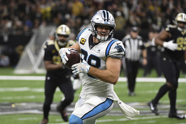 Carolina Panthers tight end Greg Olsen (88) runs the football, during the second half at an NFL football game against the New Orleans Saints, Sunday, Nov. 24, 2019, in New Orleans. (AP Photo/Bill Feig)