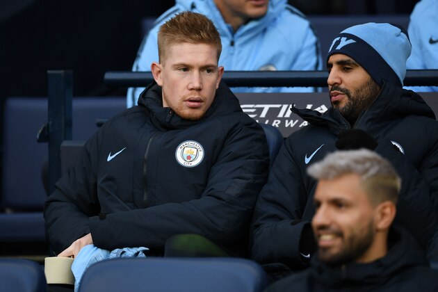 Manchester City's Belgian midfielder Kevin De Bruyne (L), Manchester City's Algerian midfielder Riyad Mahrez (R) and Manchester City's Argentinian striker Sergio Aguero (bottom) during the English Premier League football match between Manchester City and Crystal Palace at the Etihad Stadium in Manchester, north west England, on December 22, 2018. (Photo by Paul ELLIS / AFP) / RESTRICTED TO EDITORIAL USE. No use with unauthorized audio, video, data, fixture lists, club/league logos or 'live' services. Online in-match use limited to 120 images. An additional 40 images may be used in extra time. No video emulation. Social media in-match use limited to 120 images. An additional 40 images may be used in extra time. No use in betting publications, games or single club/league/player publications. /         (Photo credit should read PAUL ELLIS/AFP via Getty Images)
