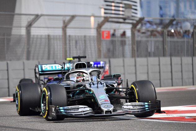Mercedes' British driver Lewis Hamilton steers his car during the qualifying session at the Yas Marina Circuit in Abu Dhabi, a day ahead of the final race of the season, on November 30, 2019. (Photo by ANDREJ ISAKOVIC / AFP) (Photo by ANDREJ ISAKOVIC/AFP via Getty Images)