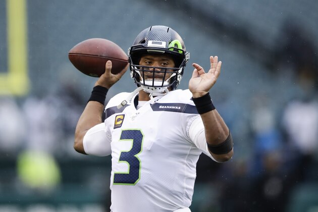 Seattle Seahawks' Russell Wilson warms up before an NFL football game against the Philadelphia Eagles, Sunday, Nov. 24, 2019, in Philadelphia. (AP Photo/Matt Rourke)