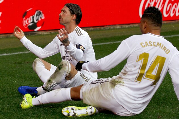 VITORIA GASTEIZ, SPAIN - NOVEMBER 30: (L-R) Sergio Ramos of Real Madrid, Casemiro of Real Madrid celebrate 0-1 during the La Liga Santander  match between Deportivo Alaves v Real Madrid at the Estadio de Mendizorroza on November 30, 2019 in Vitoria Gasteiz Spain (Photo by David S. Bustamante/Soccrates/Getty Images)