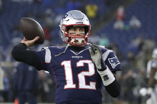 New England Patriots quarterback Tom Brady warms up before an NFL football game against the Dallas Cowboys, Sunday, Nov. 24, 2019, in Foxborough, Mass. (AP Photo/Elise Amendola)