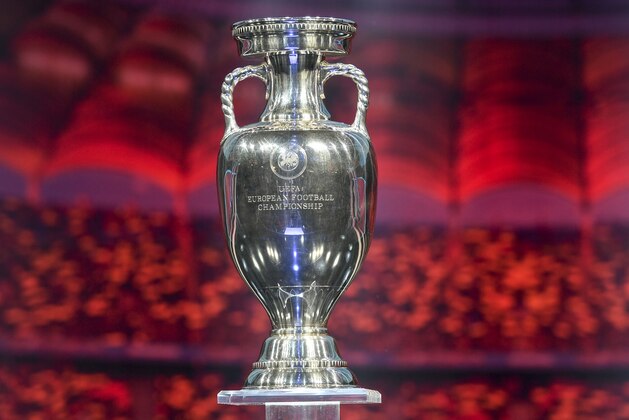 The trophy stands on the stage during the UEFA Euro 2020 football competition final draw in Bucharest on November 30, 2019. (Photo by Fabrice COFFRINI / AFP) (Photo by FABRICE COFFRINI/AFP via Getty Images)