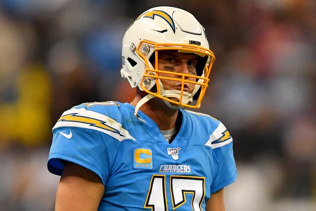 MEXICO CITY, MEXICO - NOVEMBER 18: Philip Rivers #17 of the Los Angeles Chargers walks to the huddle after a timeout during an NFL football game against the Kansas City Chiefs on Monday, November 18, 2019, in Mexico City. The Chiefs defeated the Chargers 24-17.(Photo by Alika Jenner/Getty Images)