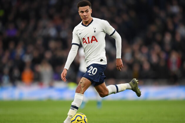 LONDON, ENGLAND - NOVEMBER 30:  Dele Alli of Tottenham Hotspur runs with the ball during the Premier League match between Tottenham Hotspur and AFC Bournemouth  at Tottenham Hotspur Stadium on November 30, 2019 in London, United Kingdom. (Photo by Shaun Botterill/Getty Images)