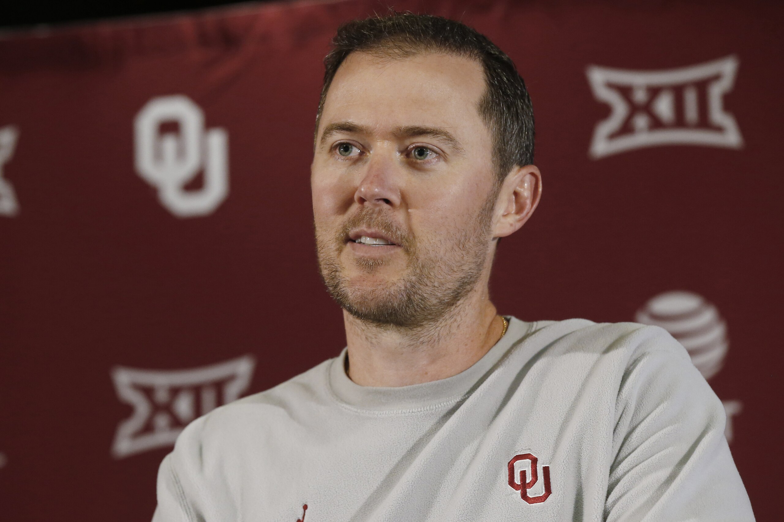 Oklahoma head coach Lincoln Riley answers a question during an NCAA college football news conference Monday, Aug. 26, 2019 in Norman, Okla. Oklahoma opens the season against Houston. Last time that happened, the Cougars pulled a stunner in 2016 that crippled Oklahoma's chances of reaching the College Football Playoff. The Sooners are well aware and don't want a repeat. (AP Photo/Sue Ogrocki)