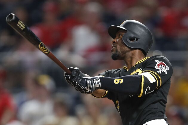 Pittsburgh Pirates' Starling Marte hits a two-run home run in the eight inning to take the lead in the eighth inning of a baseball game against the Washington Nationals, Tuesday, Aug. 20, 2019, in Pittsburgh. The Pirates won 4-1. (AP Photo/Keith Srakocic)