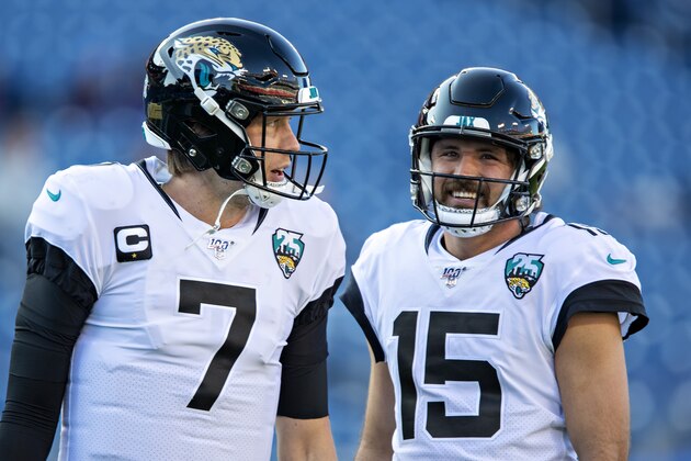 NASHVILLE, TN - NOVEMBER 24:  Nick Foles #7 and Gardner Minshew II #15 of the Jacksonville Jaguars talk before a game against the Tennessee Titans at Nissan Stadium on November 24, 2019 in Nashville, Tennessee.   (Photo by Wesley Hitt/Getty Images)