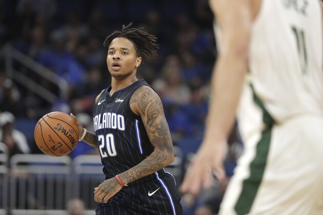 Orlando Magic's Markelle Fultz (20) moves the ball against the Milwaukee Bucks during the first half of an NBA basketball game, Friday, Nov. 1, 2019, in Orlando, Fla. (AP Photo/John Raoux)