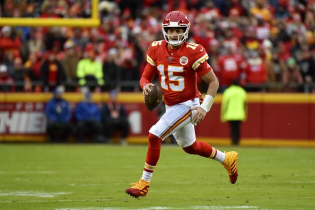 Kansas City Chiefs quarterback Patrick Mahomes (15) runs with the ball during the first half of an NFL football game against the Oakland Raiders in Kansas City, Mo., Sunday, Dec. 1, 2019. (AP Photo/Ed Zurga)