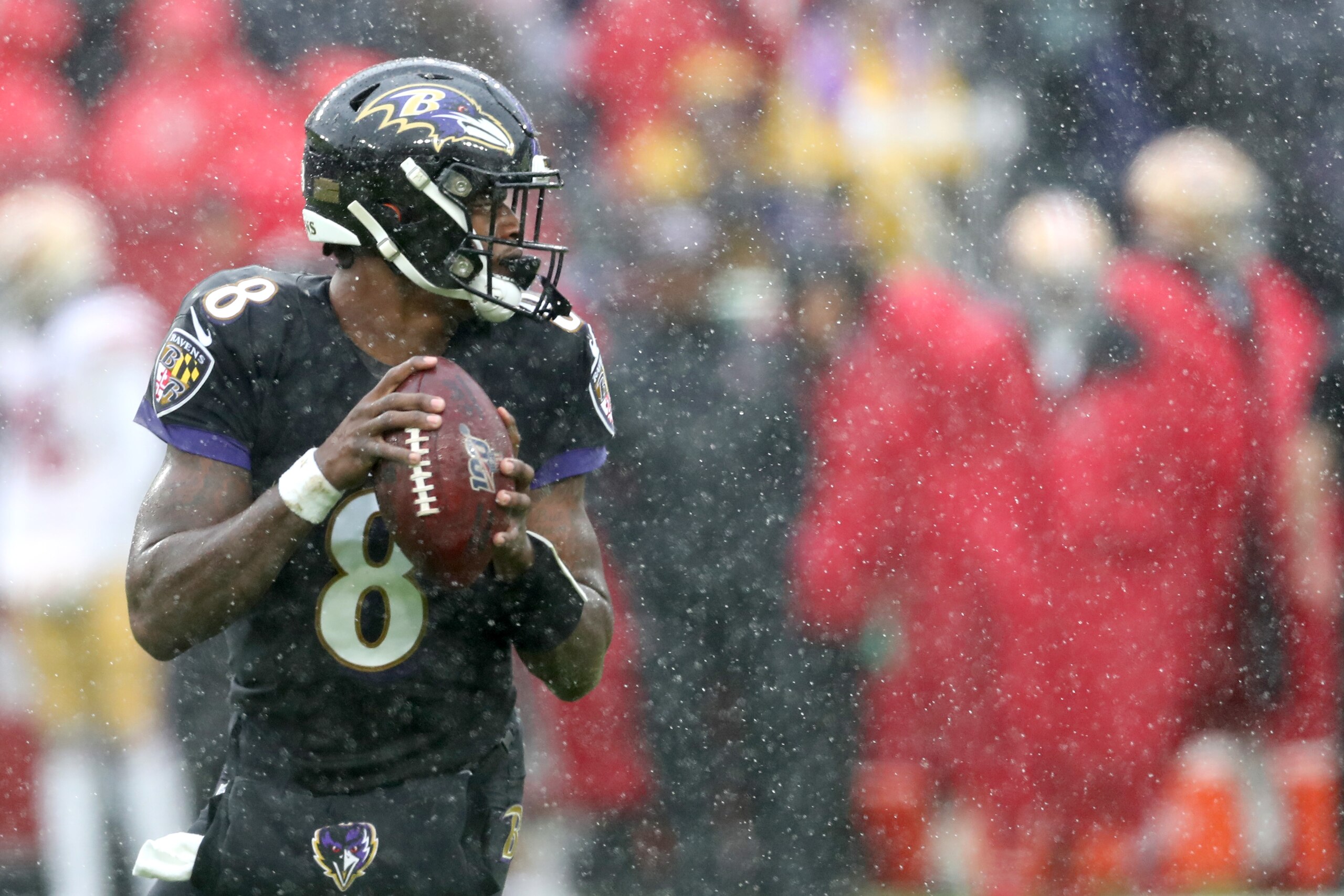 BALTIMORE, MARYLAND - DECEMBER 01: Quarterback Lamar Jackson #8 of the Baltimore Ravens drops back to pass against the San Francisco 49ers in the first half at M&T Bank Stadium on December 01, 2019 in Baltimore, Maryland. (Photo by Rob Carr/Getty Images) BALTIMORE, MARYLAND - DECEMBER 01: Quarterback Lamar Jackson #8 of the Baltimore Ravens drops back to pass against the San Francisco 49ers in the first half at M&T Bank Stadium on December 01, 2019 in Baltimore, Maryland. (Photo by Rob Carr/Getty Images)