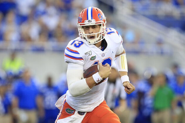 LEXINGTON, KENTUCKY - SEPTEMBER 14:   Feleipe Franks #13 of the Florida Gators runs with the ball against the Kentucky Wildcats at Commonwealth Stadium on September 14, 2019 in Lexington, Kentucky. (Photo by Andy Lyons/Getty Images)