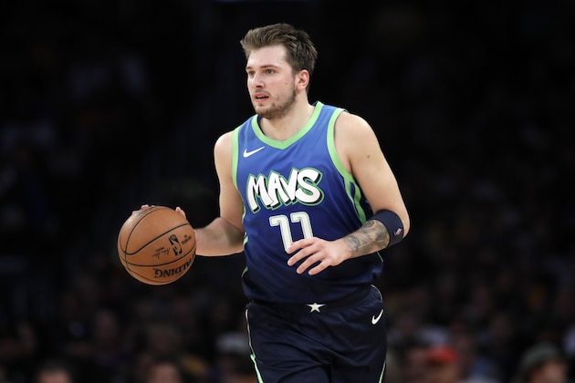 Dallas Mavericks' Luka Doncic (77) dribbles during the second half of an NBA basketball game against the Los Angeles Lakers Sunday, Dec. 1, 2019, in Los Angeles. (AP Photo/Marcio Jose Sanchez)