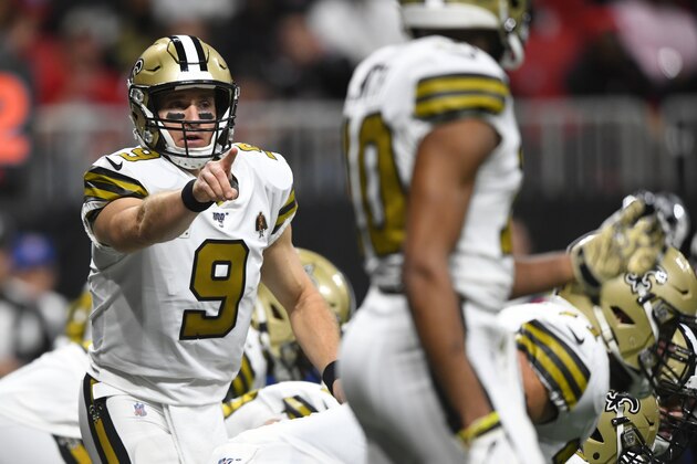 New Orleans Saints quarterback Drew Brees (9) speaks during the first half of an NFL football game against the Atlanta Falcons, Thursday, Nov. 28, 2019, in Atlanta. (AP Photo/John Amis)