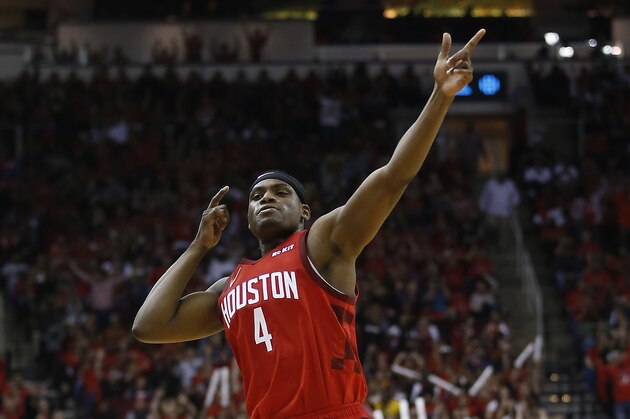 HOUSTON, TEXAS - APRIL 14: Danuel House Jr. #4 of the Houston Rockets  reacts after making a three point basket  against the Utah Jazz during Game One of the first round of the 2019 NBA Western Conference Playoffs between the Houston Rockets and the Utah Jazz at Toyota Center on April 14, 2019 in Houston, Texas. NOTE TO USER: User expressly acknowledges and agrees that, by downloading and or using this photograph, User is consenting to the terms and conditions of the Getty Images License Agreement. (Photo by Bob Levey/Getty Images)