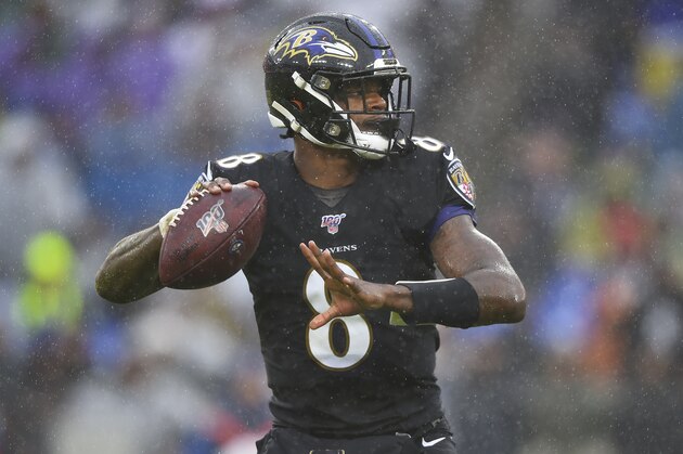 Baltimore Ravens quarterback Lamar Jackson (8) looks downfield to pass the ball against San Francisco 49ers in the first half of an NFL football game, Sunday, Dec. 1, 2019, in Baltimore, Md. (AP Photo/Gail Burton)