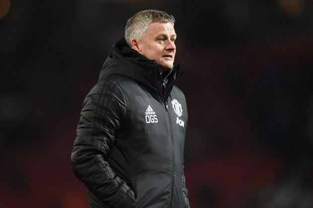 Manchester United's Norwegian manager Ole Gunnar Solskjaer leaves after the English Premier League football match between Manchester United and Aston Villa at Old Trafford in Manchester, north west England, on December 1, 2019. - The game finished 2-2. (Photo by Oli SCARFF / AFP) / RESTRICTED TO EDITORIAL USE. No use with unauthorized audio, video, data, fixture lists, club/league logos or 'live' services. Online in-match use limited to 120 images. An additional 40 images may be used in extra time. No video emulation. Social media in-match use limited to 120 images. An additional 40 images may be used in extra time. No use in betting publications, games or single club/league/player publications. /  (Photo by OLI SCARFF/AFP via Getty Images)