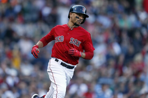 Boston Red Sox's Mookie Betts runs on his RBI single during the third inning of a baseball game against the Baltimore Orioles in Boston, Sunday, Sept. 29, 2019. (AP Photo/Michael Dwyer)