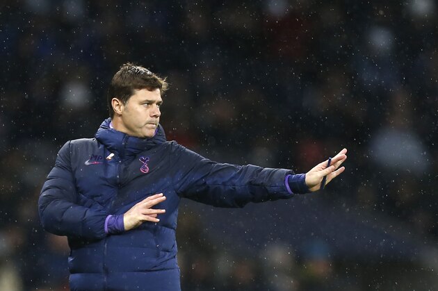 Tottenham Hotspur's Argentinian head coach Mauricio Pochettino gestures during the English Premier League football match between Tottenham Hotspur and Sheffield United at Tottenham Hotspur Stadium in London, on November 9, 2019. (Photo by Ian KINGTON / AFP) / RESTRICTED TO EDITORIAL USE. No use with unauthorized audio, video, data, fixture lists, club/league logos or 'live' services. Online in-match use limited to 120 images. An additional 40 images may be used in extra time. No video emulation. Social media in-match use limited to 120 images. An additional 40 images may be used in extra time. No use in betting publications, games or single club/league/player publications. /  (Photo by IAN KINGTON/AFP via Getty Images)